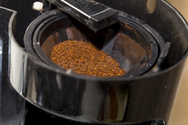 Closeup Of Ground Coffee Inside Filter Stock Photo