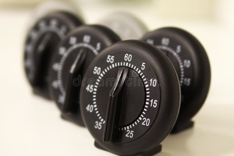 Close up of a group of analog stop watches stock photo Close up of a group of analog stop watches stock photo