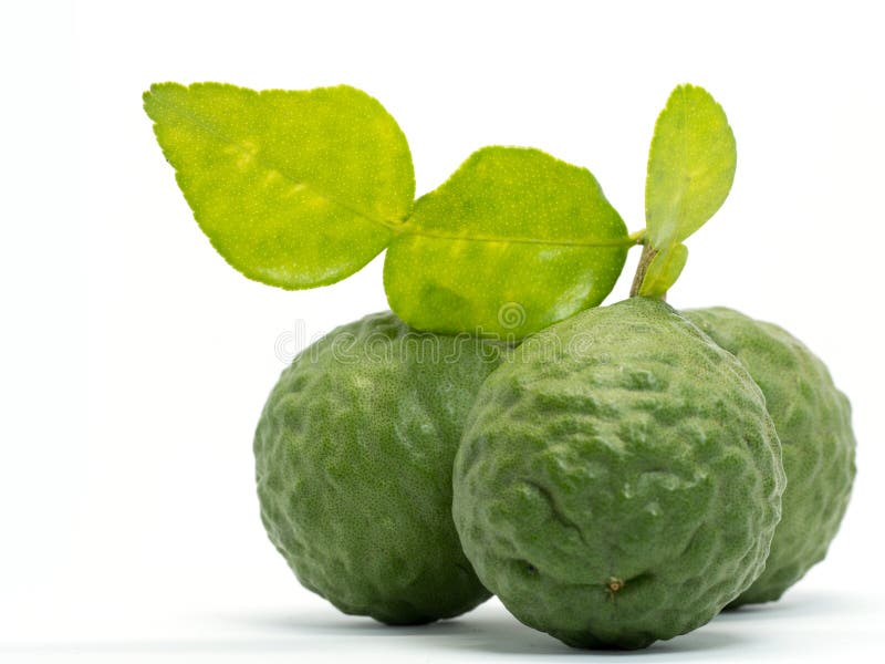 Close up group of fresh bergamot with green leaves isolated on white background. benefits of bergamot for beauty and health concep stock image Close up group of fresh bergamot with green leaves isolated on white background. benefits of bergamot for beauty and health concep stock image