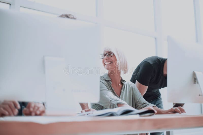 Close up. a group of web designers working on new sketches. stock photo
