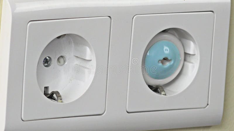 close up hand cover electricity outlet wall with safety plug. 4K