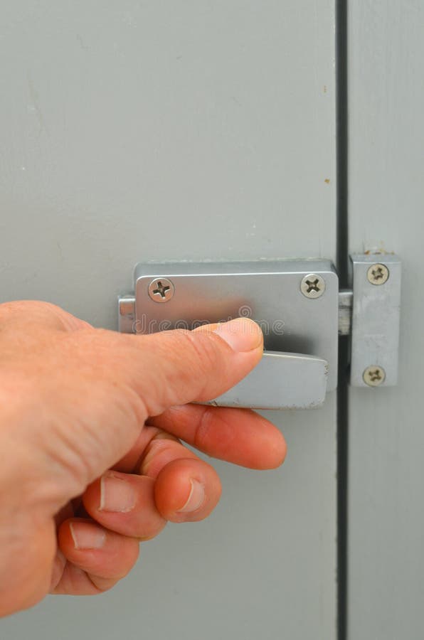 Close up hand on door lock stock image. Image of blurred 83726043