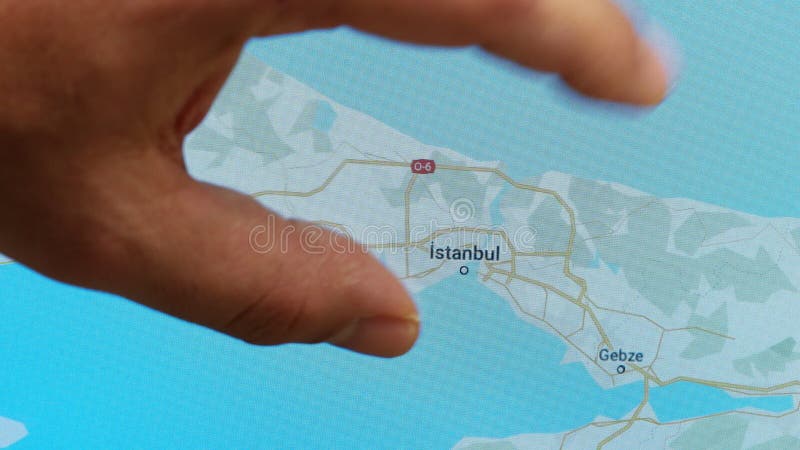 Close up hand gesture on touch screen zoom in Istanbul city Turkey stock video footage