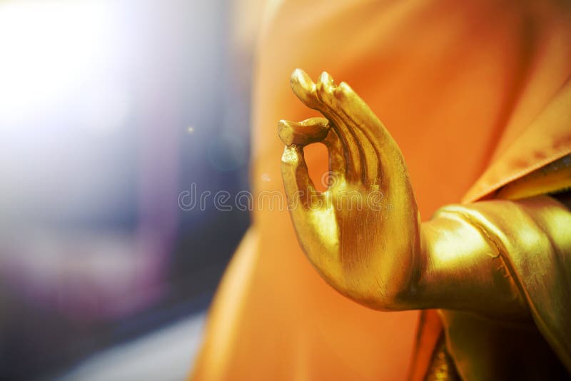 Close up hand of Golden buddha statue