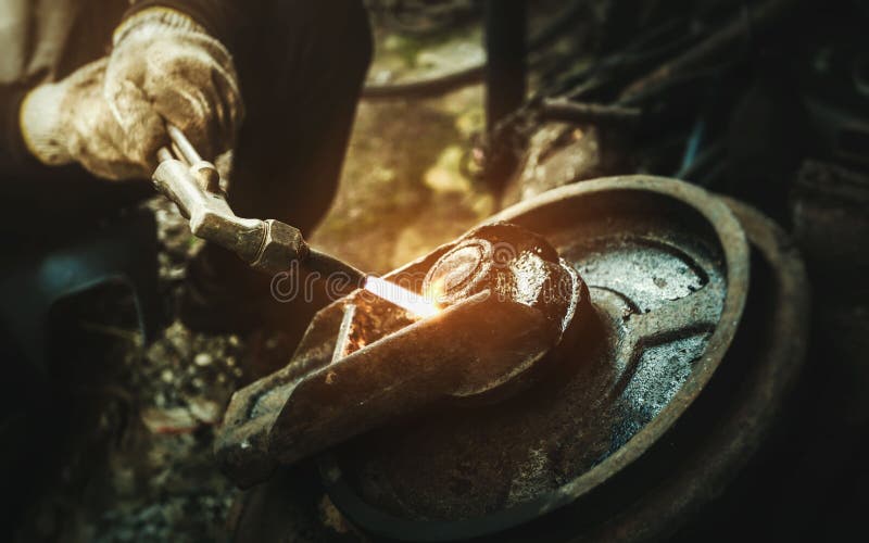 Close Up Hand Heavy Industrial Worker is Working on Metal Work Factory