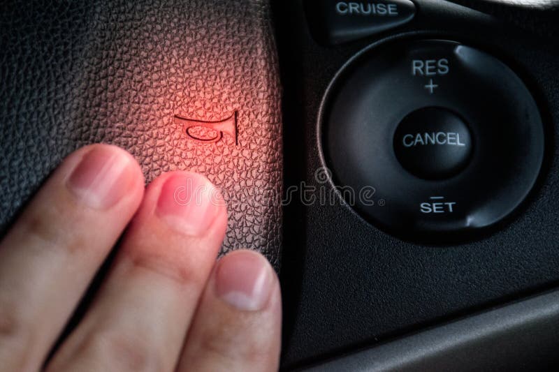 Close Up of Hand Pressing the Horn on the Steering Wheel of a Car with