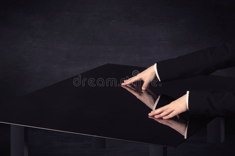 Close up of a hand touching smart table with copy space stock image