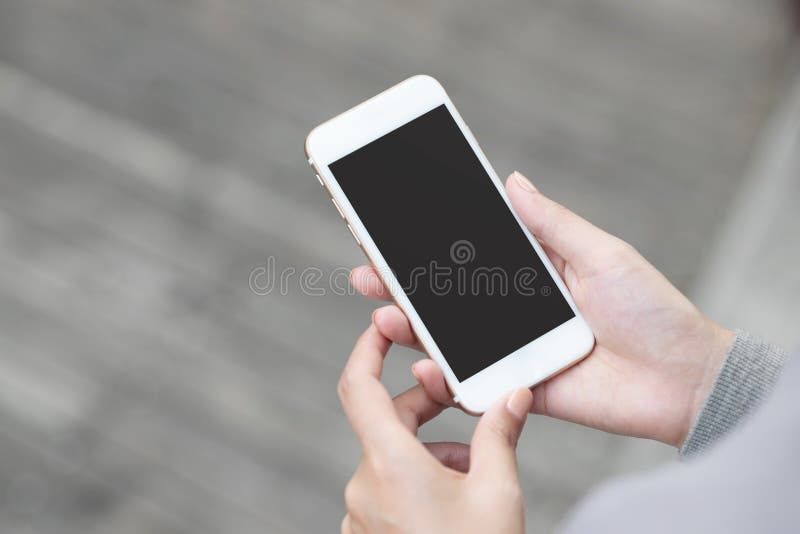 Close up hand young woman in watching message on mobile smart phone during break. using cell phones to communicate in the online w