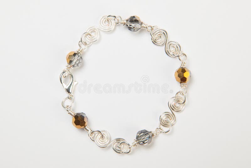 Handmade bracelet made of silver and beads royalty free stock photography