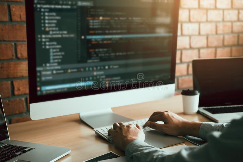 Close up of hands contemporary website developer man typing and writing code for program website royalty free stock image