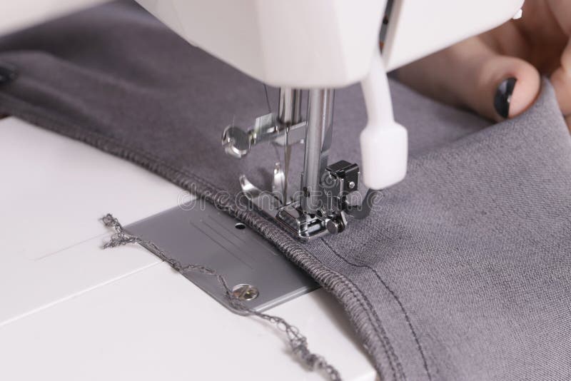 Closeup of Hands Sewing on Machine Stock Image Image of process