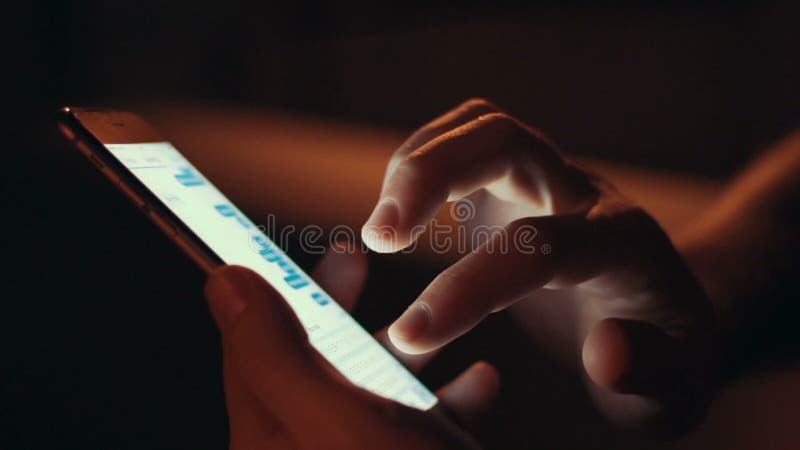 Close up of hands using smart phone