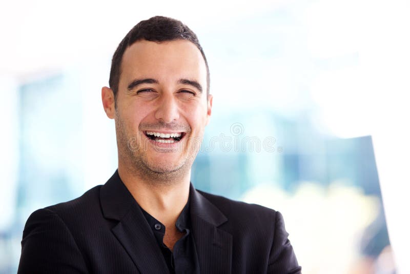 Close up happy businessman laughing