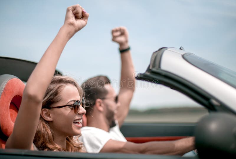 Close up.happy loving couple traveling in a car. royalty free stock photography Close up.happy loving couple traveling in a car. royalty free stock photography