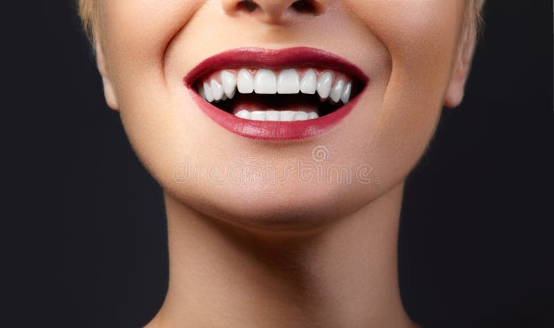 Close-up Happy Smile with Healthy White Teeth, Bright Red Lips Make-up. Cosmetology, Dentistry and Beauty care stock images Close-up Happy Smile with Healthy White Teeth, Bright Red Lips Make-up. Cosmetology, Dentistry and Beauty care stock images