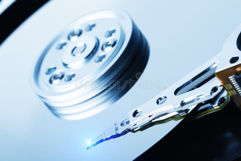 Close Up of Hard Disk with Clean Surface and Working Laser Head Stock