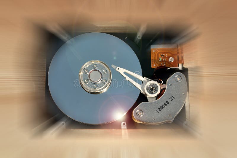 Close up of hard disk drive on wood background royalty free stock images