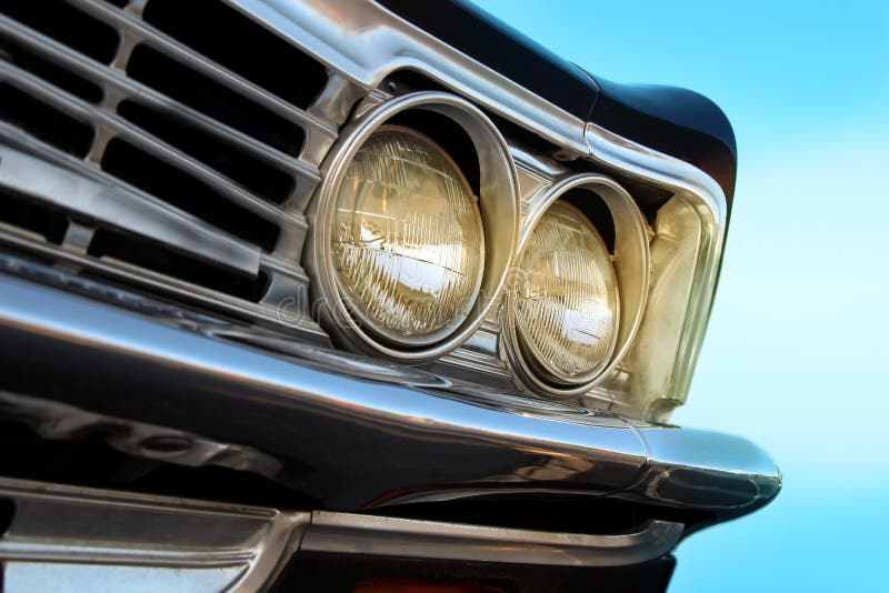 Close up of headlight lamp retro vintage car. stock photography