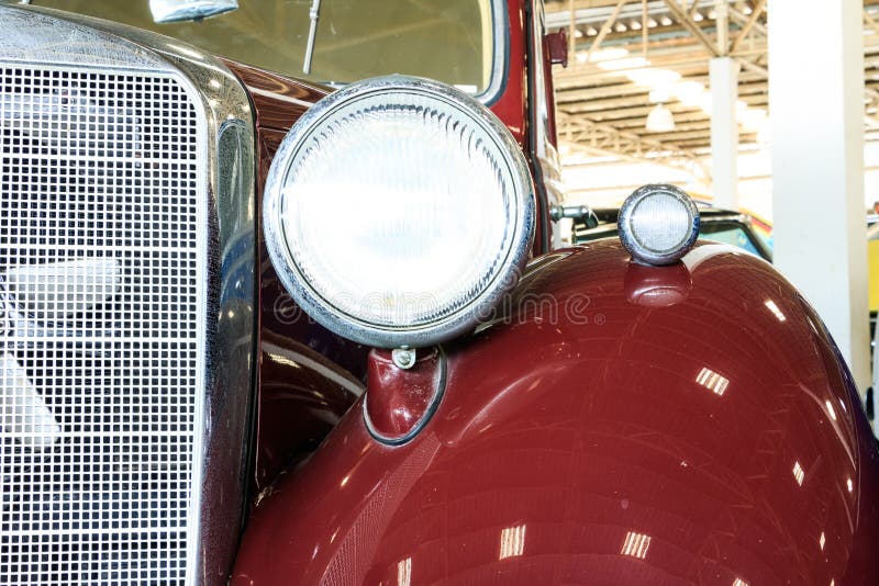 Close Up of Headlight Lamp Vintage Classic Car.