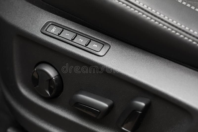 Closeup of Height and Position Adjustment Panel for Driver`s Leather