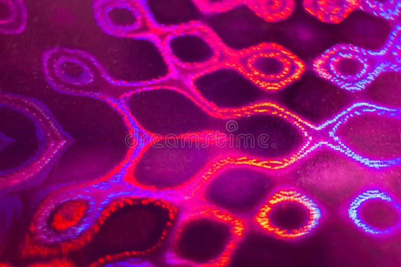 Close-up helder buitensporig multicolored holografisch patroon royalty-vrije stock foto's Close-up helder buitensporig multicolored holografisch patroon royalty-vrije stock foto's