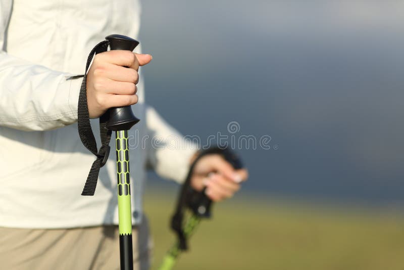 Close up of a hiker hands walking with poles royalty free stock photos Close up of a hiker hands walking with poles royalty free stock photos