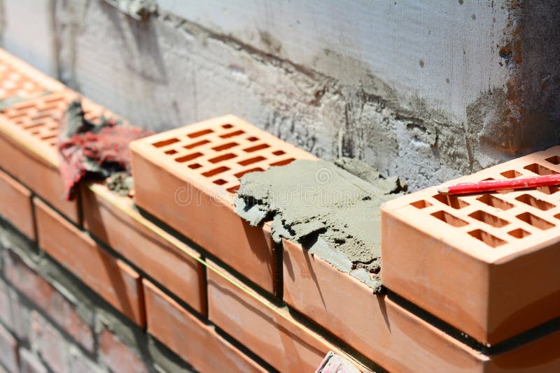 Close Up on House Constuction Wall with Ceramic Bricks Stock Image