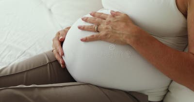 Pregnant Woman Big 9 Month Baby Bump Under White Cloth Stock Image