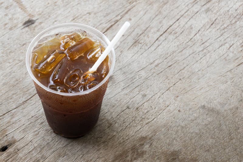 Close Up Ice Of Americano Or Black Coffee On Wood