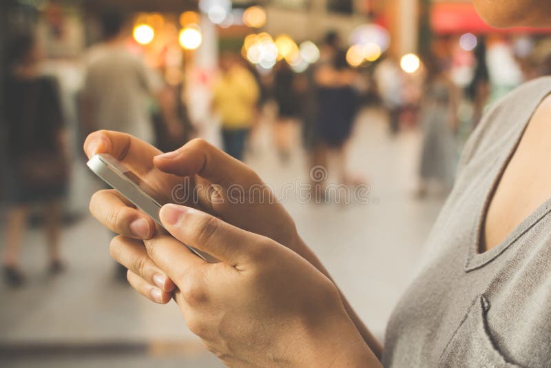 Close up image hand of happy woman are using a mobile phone stock photo