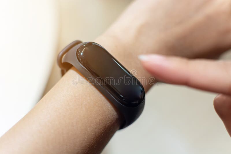Close up image hand of male using smart watch app. Business, technology and people concept stock photography