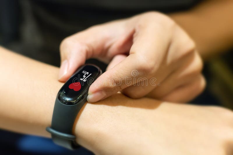 Close up image hand of male using smart watch stock images