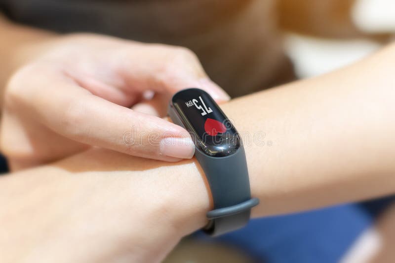 Close up image hand of male using smart watch with health app checking stock photos