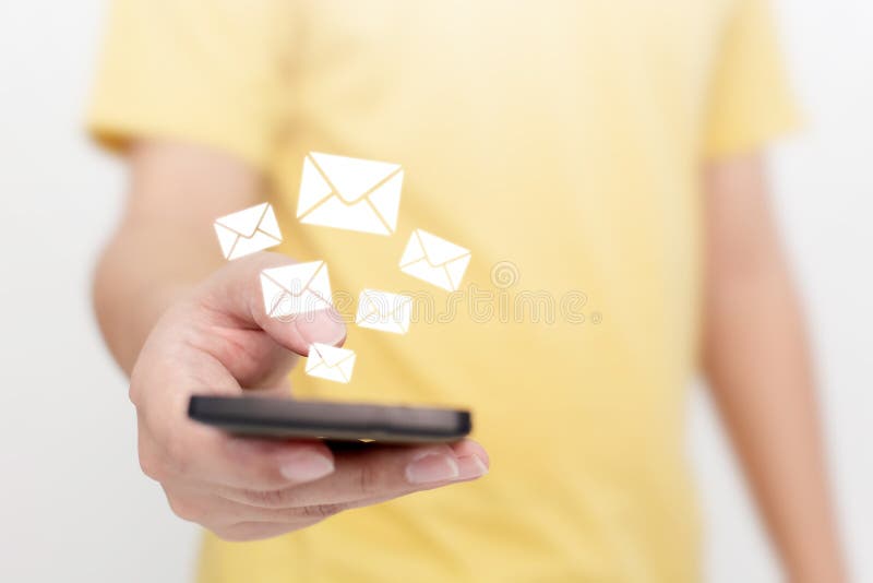 Close-up image hand using smartphone with icon envelope email royalty free stock images