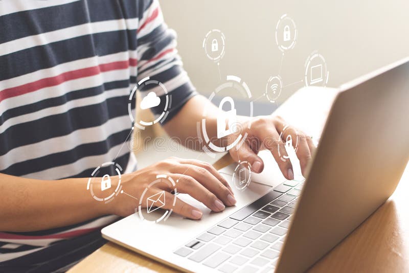 Close-up image of male hands using computer laptop with icon graphic cyber security royalty free stock photo