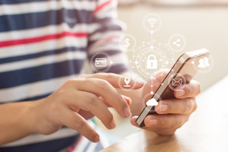 Close-up image of male hands using mobile smartphone with icon graphic cyber security network stock images