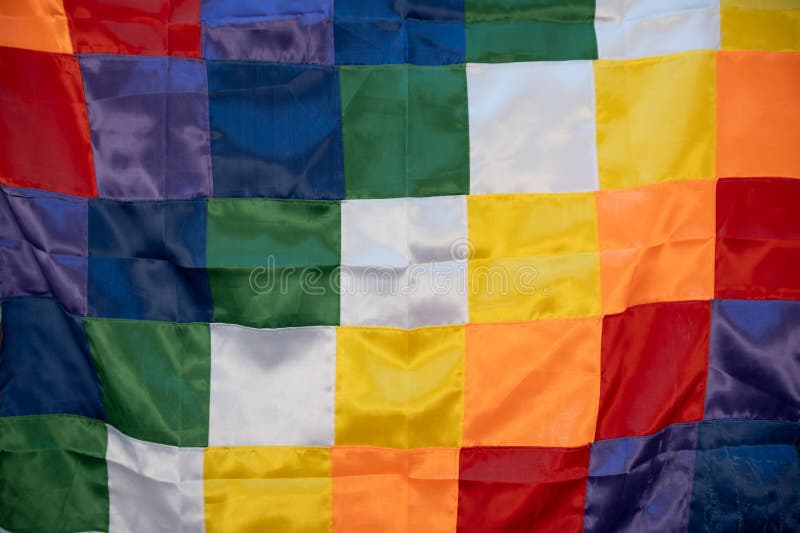 Close up image of a silk Wiphala Flag - a symbol commonly used to represent native peoples of the Andes stock images