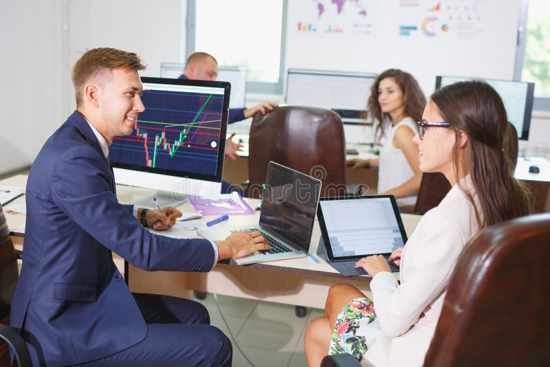 Image of two young businessmen using touchpad at meeting royalty free stock photo Image of two young businessmen using touchpad at meeting royalty free stock photo