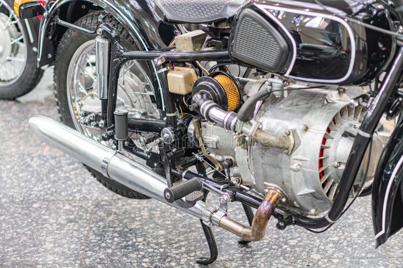 Close-up image of a vintage motorcycle engine, showcasing intricate design and mechanical precision Main components are metallic stock image