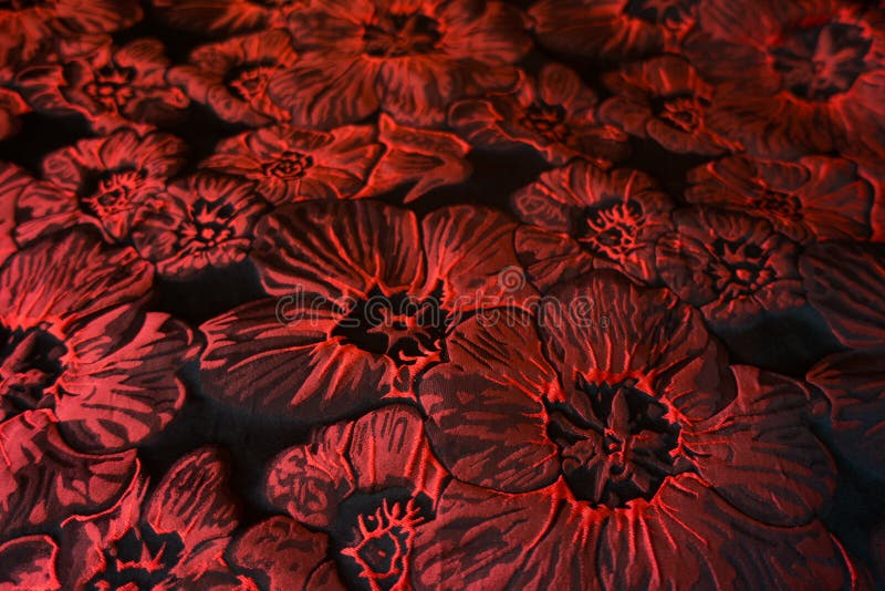Close up of jacquard cloth with crimson red flowers royalty free stock images Close up of jacquard cloth with crimson red flowers royalty free stock images