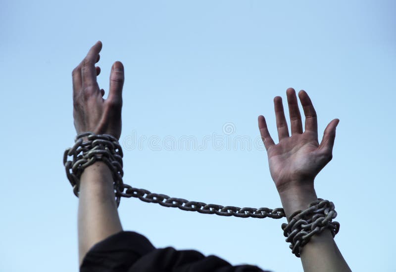 Attractive Young Woman Shackled In Chains Stock Photo, Picture and Royalty  Free Image. Image 5202772.