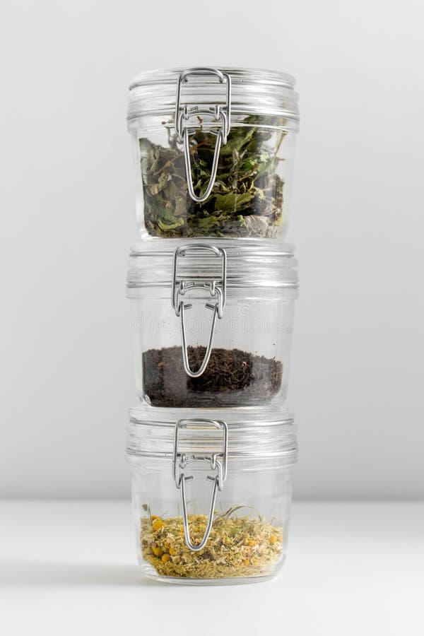 Close Up of Jars with Dried Herbs on White Table Stock Photo Image of