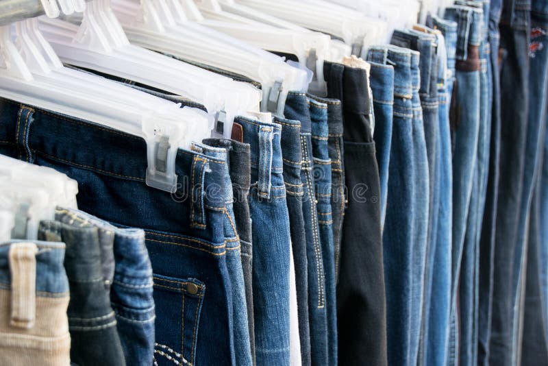 Jeans on hangers stock image. Image of hanger, cloth - 20624259