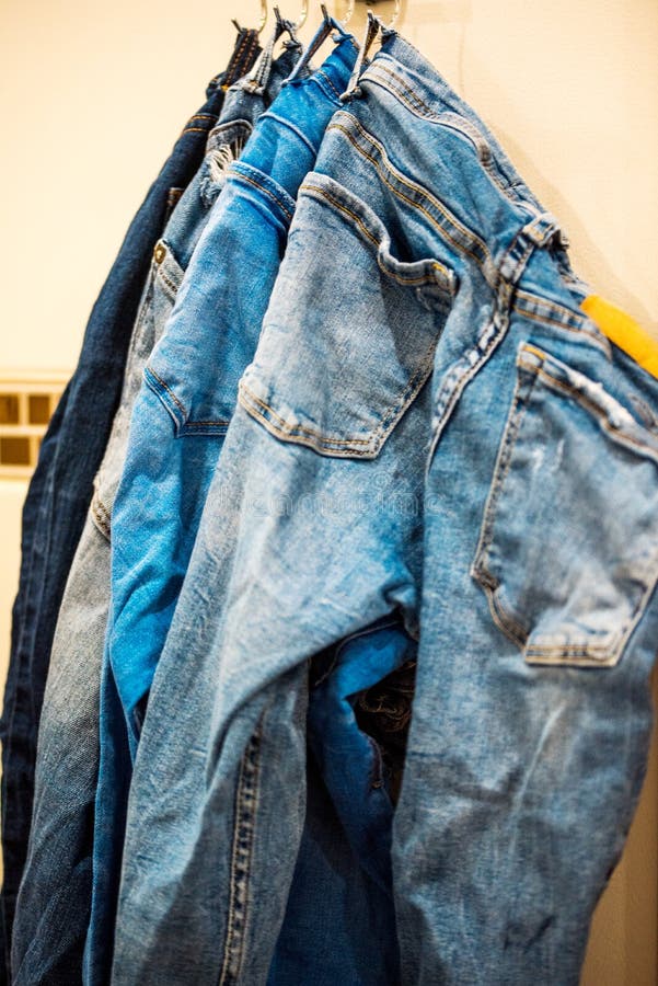 Close up of jeans on a rack stock photos Close up of jeans on a rack stock photos