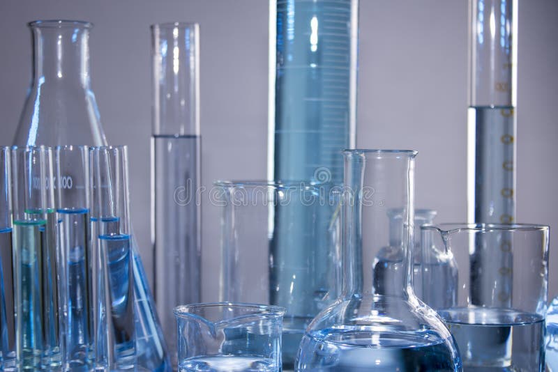 Close Up of Labware Such As Beaker, Flask, Graduated Cylinders and Test
