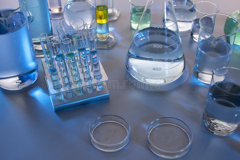 Close Up of Labware Such As Beaker, Flask, Graduated Cylinders and Test