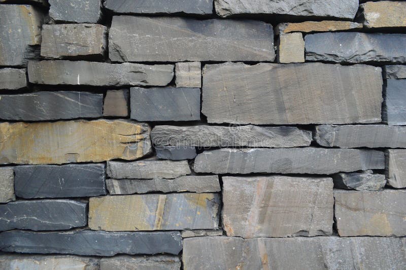 Slate cut to make stones for a dry stone wall