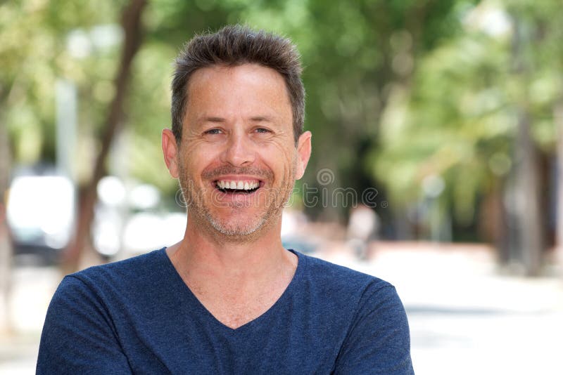 Close Up Laughing Casual Man Standing in Park Stock Photo - Image of