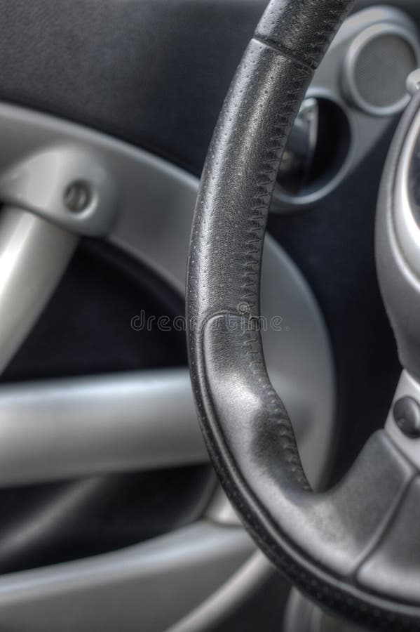 Close Up of Leather Car Steering Wheel royalty free stock images
