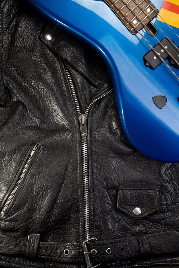 Close-up of a leather jacket with guitar royalty free stock photo